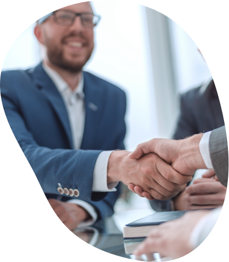 business men in suits shaking hands